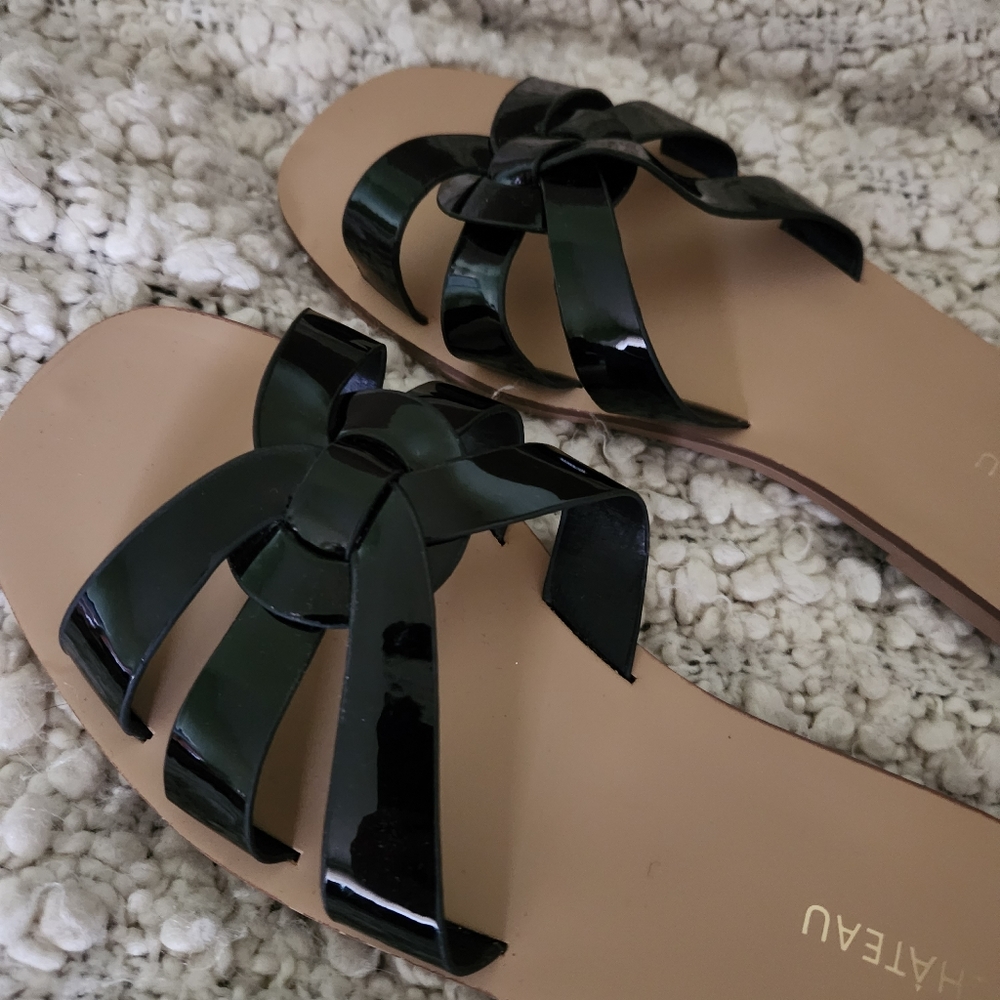 Le Chateau shiny black flat slides sandals. New